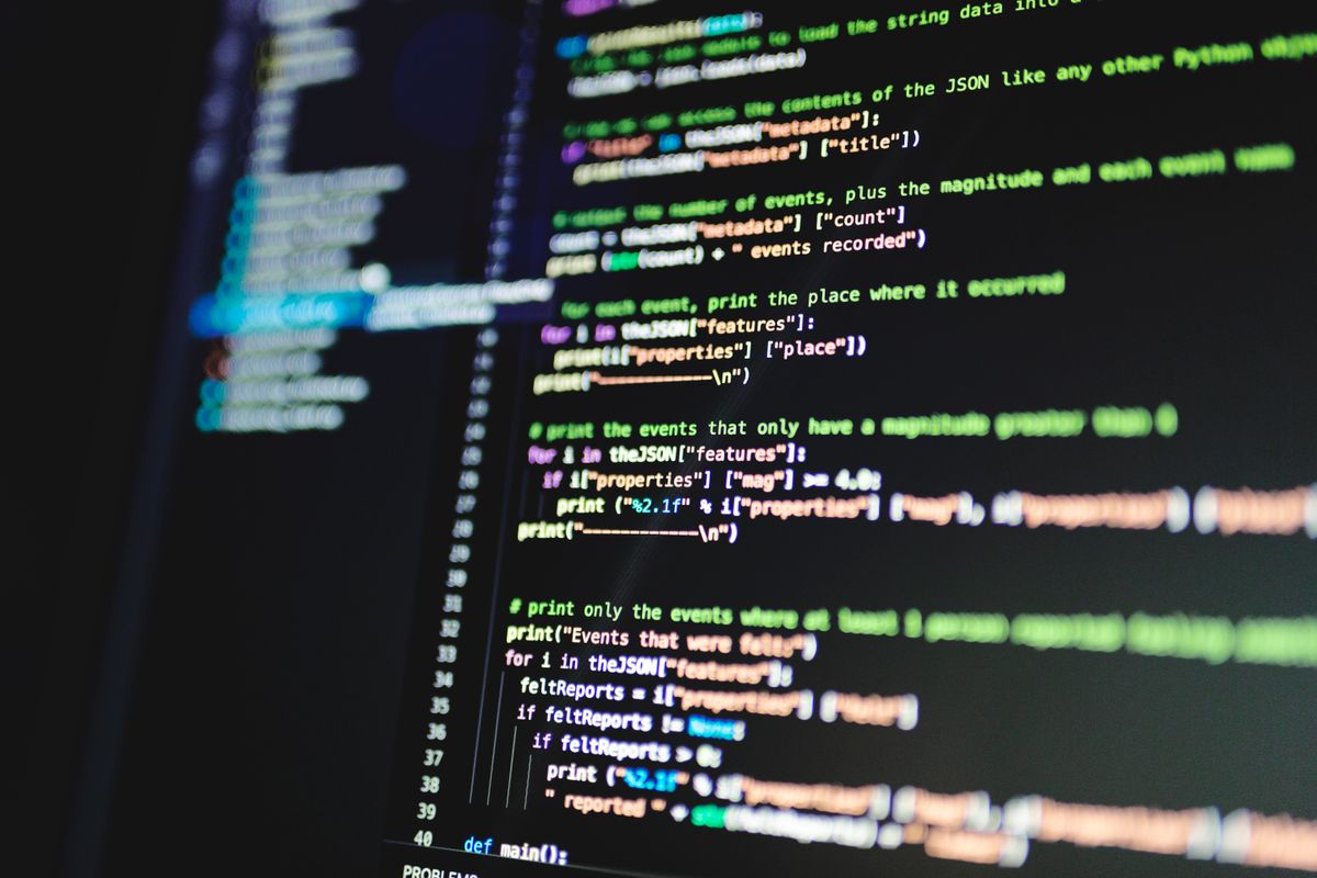 Programming code on a dark monitor